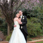 Couple under jacaranda tree