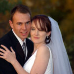 Bride and groom looking happy after wedding