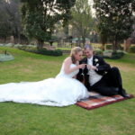 Bride and groom enjoy a glass of champagne