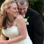 Bride and groom have a laugh