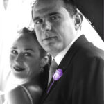 Bride and groom in archway