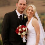 Bride and groom smile after wedding ceremony