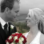 Bride and groom have a moment by the Drakensberg