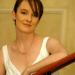 Bride on staircase at wedding