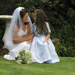 Bride with daughter at wedding