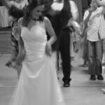 Bride dancing at Greek wedding