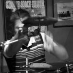 Drummer playing at Radium
