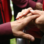 Couple exchanging rings at a wedding