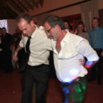 Groom and dad dancing