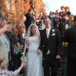 Couple showered with confetti after wedding