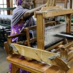 Woman weaving silk in Graskop