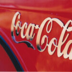 Side of truck displaying Coca-Cola logo
