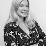 Smiling blonde in corporate portrait